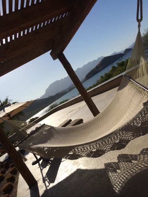 A hammock with a bay behind it at an all-inclusive resort in Loreto, Mexico.